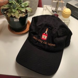 A black “hennything can happen” hat
